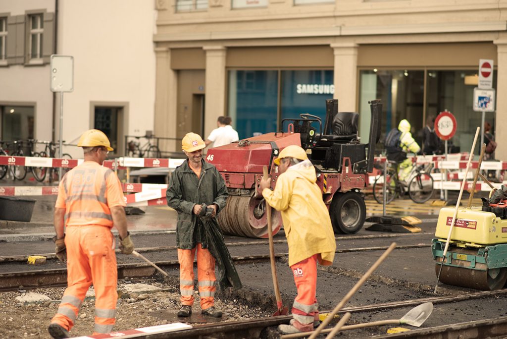 ground workers in London with insurance